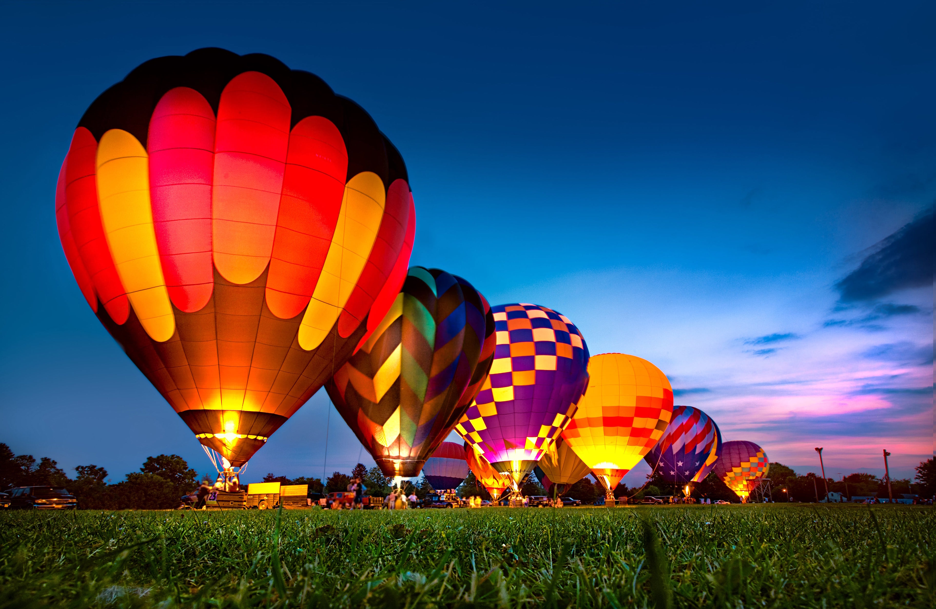 Modern hot air balloons prepared to fly
